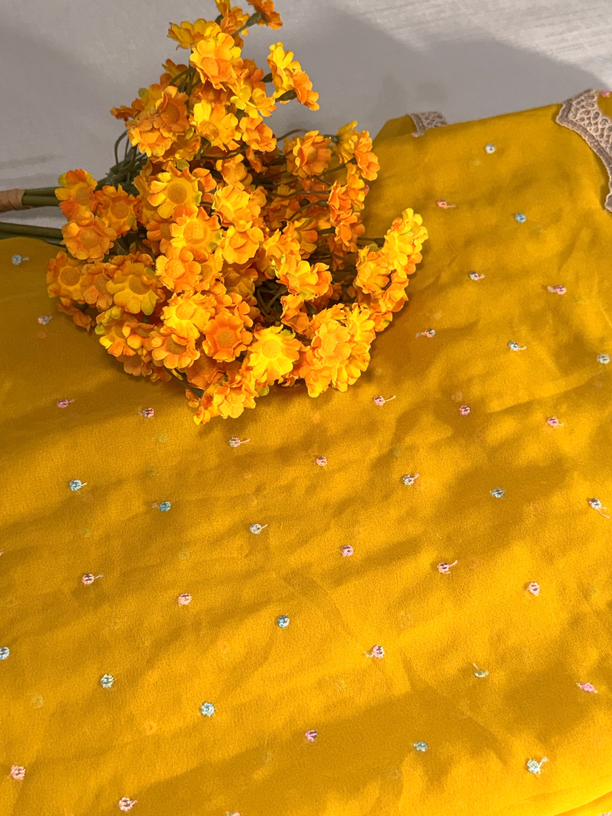 Mustard Georgette Saree — Scalloped Lace Border & Embroidered Buti