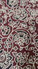 Crimson Ajrakh white floral jaal print — closeup