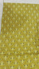 Marigold Ajrakh print — buti closeup